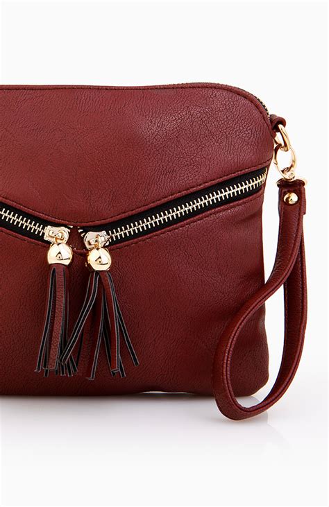 Burgundy Cross Body + FREE SHIPPING .